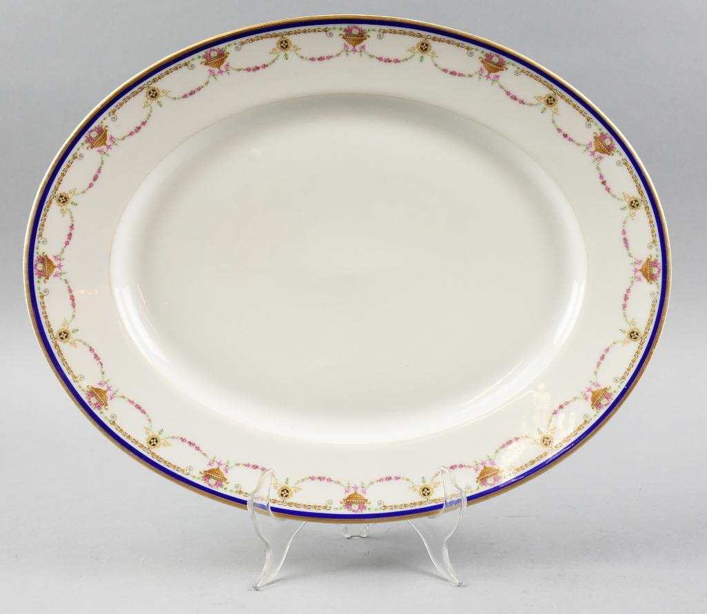 Antique Limoges France B&Co Porcelain Platter: Beautiful platter is Limoges L. Bernardaud & Co. The floral details include filled urns and swags around the rim and cobalt and gold gilt on the edges. Clearly double marked on the bottom and meas