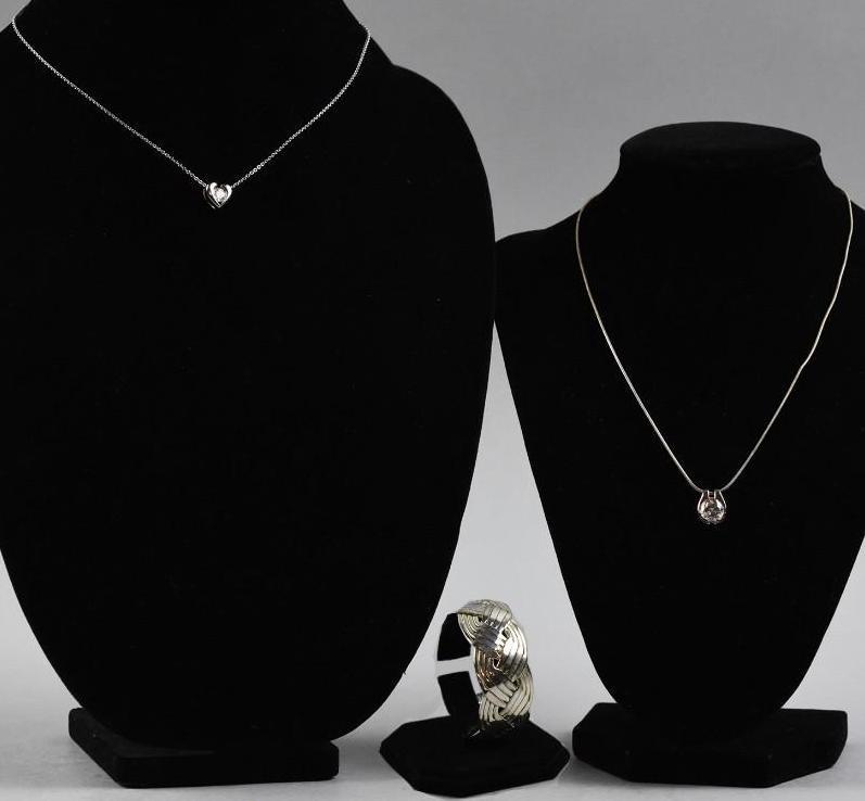 Edwin Pearl Sterling Jewelry Lot: Beautiful Erwin Pearl sterling silver jewelry. All sterling silver, stamped .925, cuff braided design and comes in original box with pouch and where purchased. 1" wide. Both necklaces are also E P