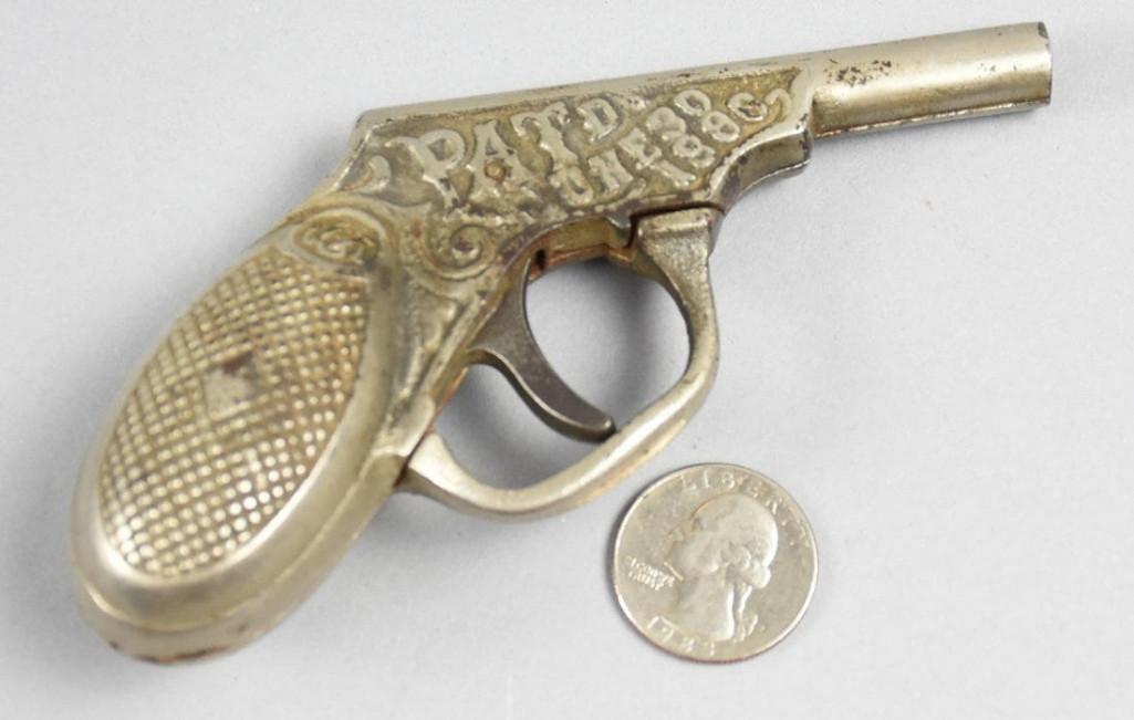 1896 Parker Stearns Liquid Pistol: Awesome find for those who prefer water pistols to cap guns. This Parker Stearns Liquid Pistol has a patent date of June 30 1896. It appears to be cast steel and looks to be fully fu