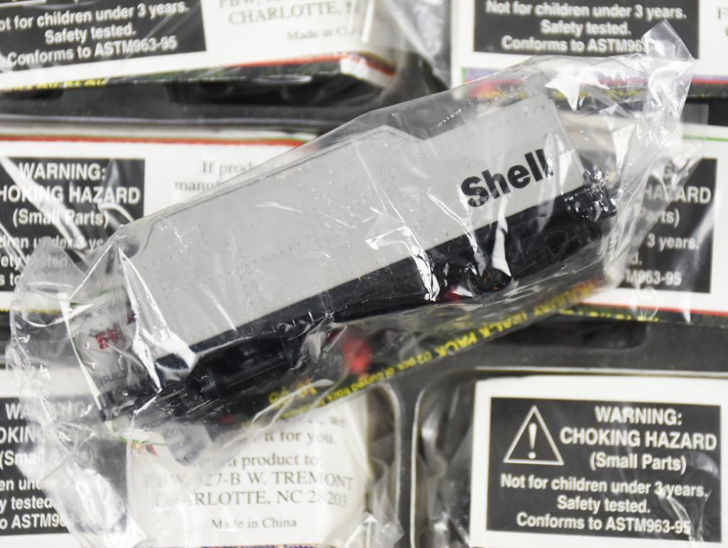Huge Lot 1995 Shell Promotional Coal Tenders: This huge lot of coal tenders were a 1995 promotion for Shell Oil Fletcher, Barnhart & White. None have been removed from the plastic packaging and all are in the original shipping box. See specs prin