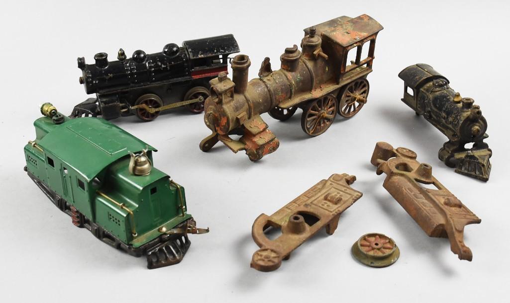Vintage & Antique Cast Iron Locomotive Parts & More: This is a great lot for those who are creative. These locomotives are in various stages of disrepair. Most are cast iron pieces and include Harris and Ives. Included are a couple of pieces, unknown wh