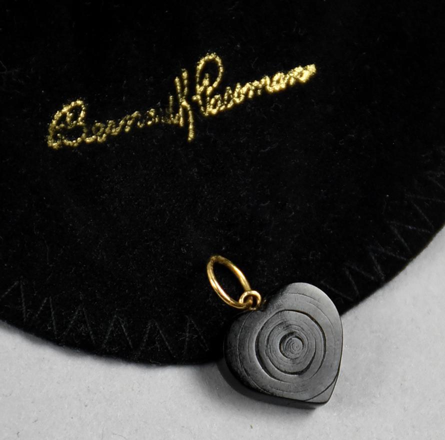 Bernard Passman Black Coral Heart Pendant w/ 14K: This is a beautiful black carved coral heart pendant with 14K bale and jump ring. Bernard Passman (1916-2007) was a sculptor and jeweler who founded a black coral jewelry company. This piece comes on