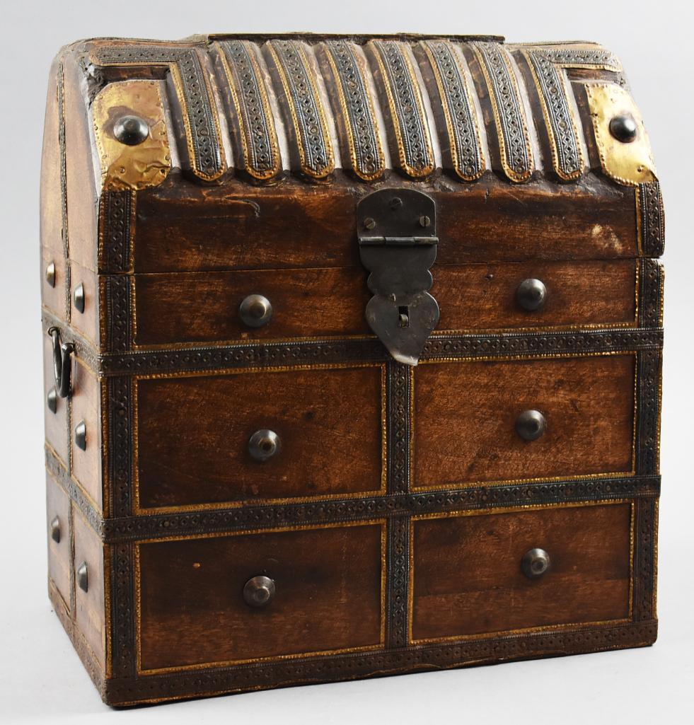 Vintage Wooden Liquor/Wine Trunk Tantalus: Very cool trunk with compartments inside to hold your favorite liquor or wine bottles. It is domed with drawers with applied antiqued brass knobs and latch. Measures 14.5" tall x 9" x 13"