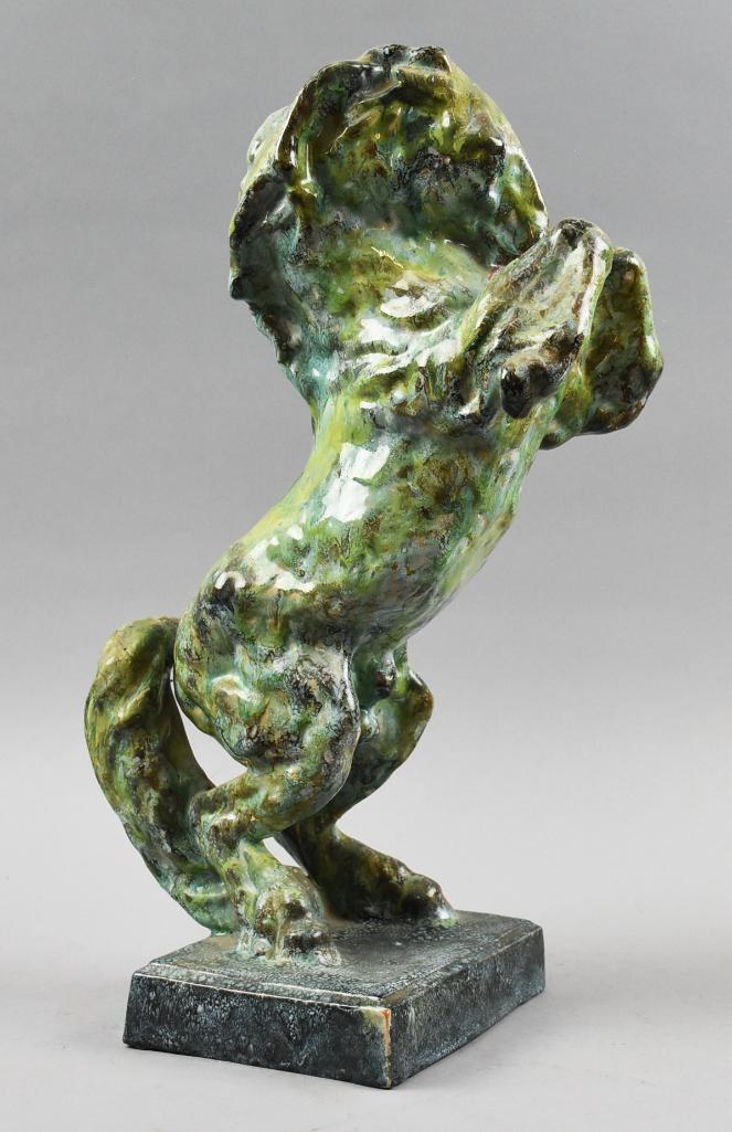 Vintage Ceramic Rearing Horse Sculpture, Austria: This is a great rearing horse sculpture that appears to have been hand crafted in pottery clay. The glaze gives it a cool patinated bronze look. It is marked Made in Austria on the bottom with the Rom