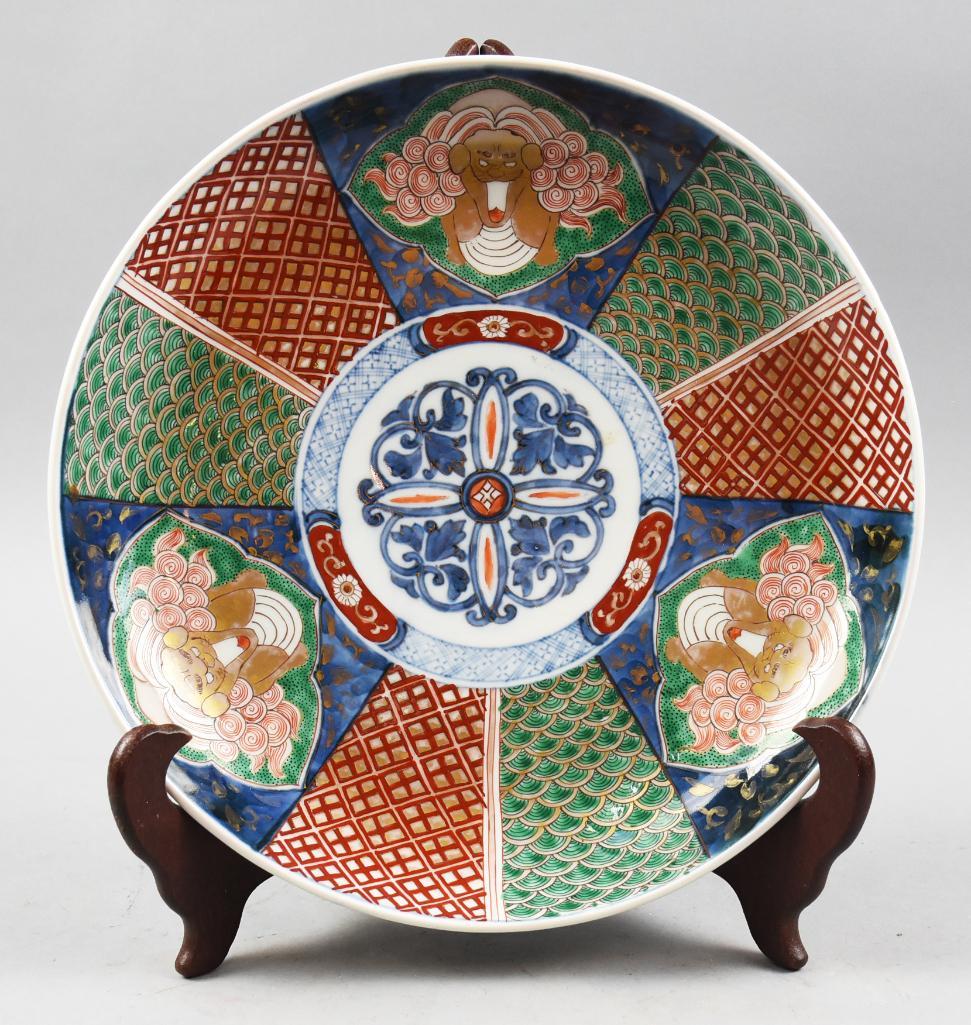 Antique Meiji Period Japanese Imari Porcelain Charger: This gorgeous porcelain charger is of Japanese origin. Appears to be Meiji Period Imari with iron red and green with gold accents. Nicely decorated on outer rim, unsigned. Measures 12" across