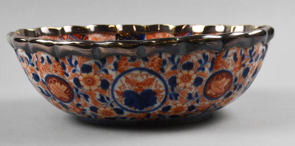 Antique Signed Japanese Imariâ€œFukagawa Bowl: Stunning Imari porcelain bowl measuring 9" x 12" x 4" deep. Bold oranges and blues are accented with a silver gilt scalloped rim. Signed on the bottom,â€œKoransha”. And markings appears to b