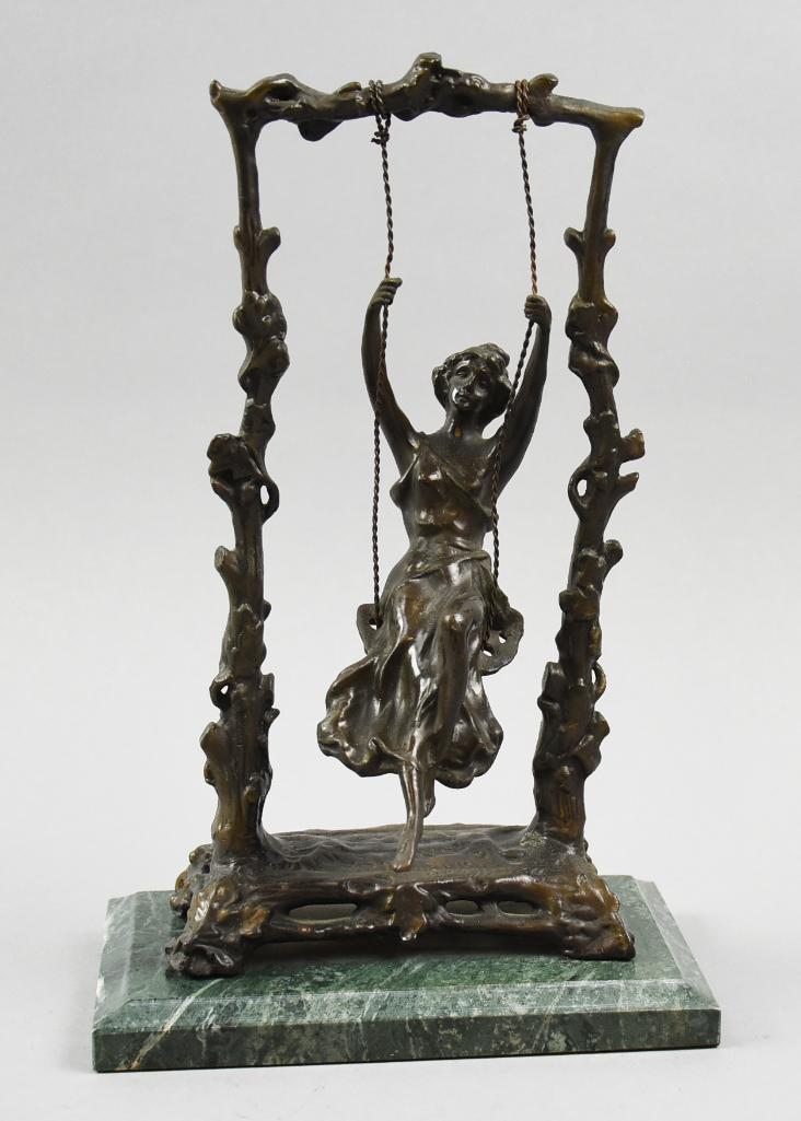After Auguste Moreau (1834-1917) "Swing Girl": Sweet after Auguste Moreau (1834-1917) sculpture is known as Swing Girl. Artist last name is impressed into the piece and she has been mounted to a green marble base, 10.5" tall x 4 x 7