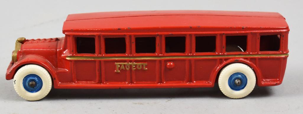 c1925 Arcade Cast Iron Fageol Safety Coach/Bus: This is a c1925 Fageol Safety Coach from Arcade Mfg Co. Great looking with the embossed Fageol name on the sides. Bus has a gold accent stripe with gold headlamps and black grill. Manufacturer is embo