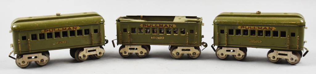 Prewar Dorfan Wide Gauge Pullman Cars w/ Riders: Nice little collection of prewar Dorfan wide gauge Pullman cars, there is one pair of Seattle cars and one Boston, each with passengers. Dorfan used the term Wide Gauge because Lionel trademarked Stan