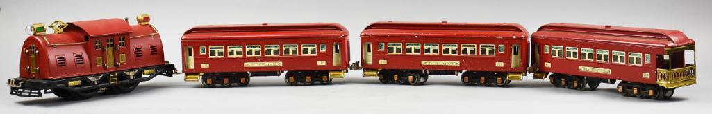 Prewar Lionel No. 10 Electric Locomotive/Passenger Cars: This great lot of prewar Lionel includes a No. 10 electric locomotive, standard gauge, a pair of No. 710 Pullman cars and a No. 712 Observation car, all 'O' gauge. All appear original and complete.