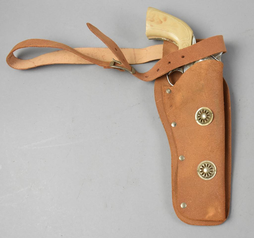 Vintage Kilgore Rebel Cap Gun, Suede Holster: Great looking vintage Kilgore Rebel cap gun with tan suede leather holster adored with faux conchos. Gun measures approx 11" long