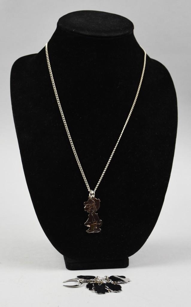 Concra Sterling & 800 Silver Jewelry: Cute lot with Concra sterling head charms monogrammed and dated for children, 5 in total, attached to a ring with a sterling horseshoe by same mfg. Also Charlie Brown and Lucy charms stamped 800 and s