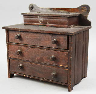 c1880 Salesman Sample/Doll House Empire Style Chest: This is a great looking salesman sample or doll house chest of drawers. Appears to be pine with dark mahogany finish. Three drawers with wood pulls with top storage with lift top. Saw marks