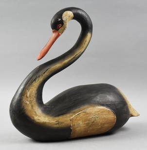 Primitive Antique Black Swan Decoy: Gorgeous and expertly crafted swan decoy. Entirely hand carved with fine details and hand painted. Unknown origin or maker, measures approx 15" x 15"