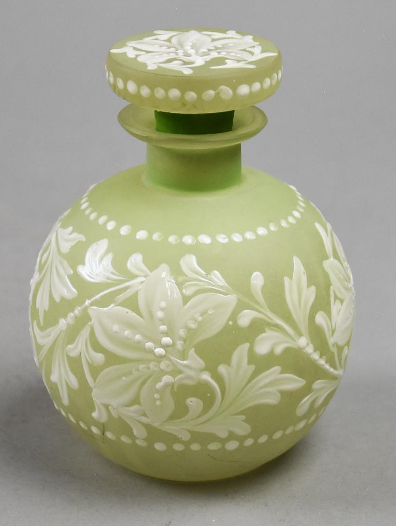 Vintage Czechoslovakia Satin/Enamel Glass Perfume: Beautiful antique satin glass perfume bottle. Pale green glass with hand painted white enamel flowers with beading along top and bottom and green cork stopper. Acid marked on bottom Czechoslovakia
