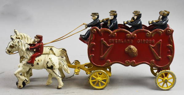 Antique Kenton Horse Drawn Overland Circus Band Wagon: This great looking antique toy is from Kenton Hardware Co. This two horse drawn wagon is for the Overland Circus and is carrying the circus band. Appears to be all original and retains one horse rider