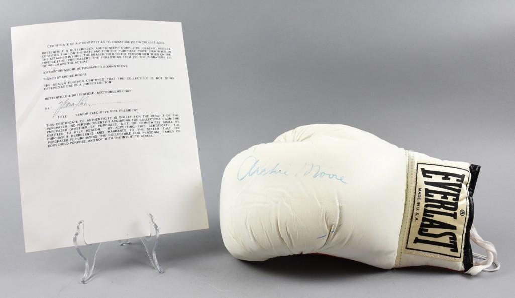 Boxing Legend Archie Moore Autographed Glove W/ Pro.: "The Mongoose", Archie Moore had the longest boxing career of anyone and held the World Light Heavyweight title longer than anyone. After retiring, he continued to coach for a short time whose student