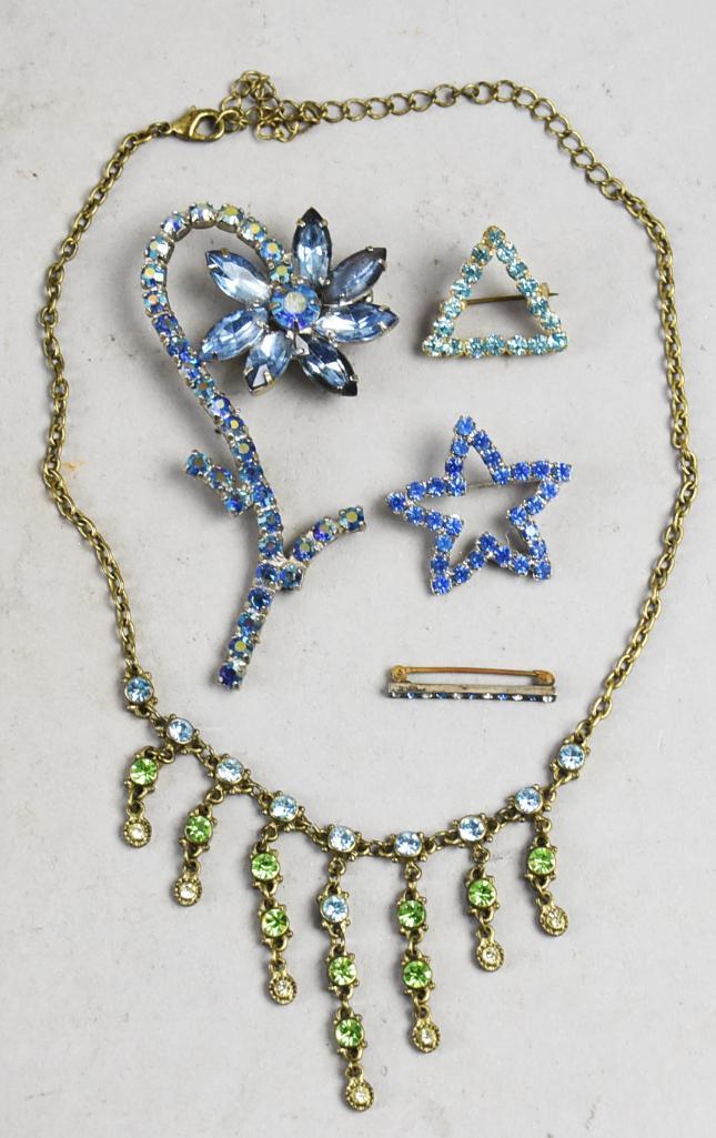 Vintage Costume Jewelry Lot, Necklaces, Brooches: These pretty rhinestone pieces are nice costume jewelry. Necklace with blue and green rhinestones goes nicely with any or all the brooches, all with varying shades of blue. The bar pin reads sterling