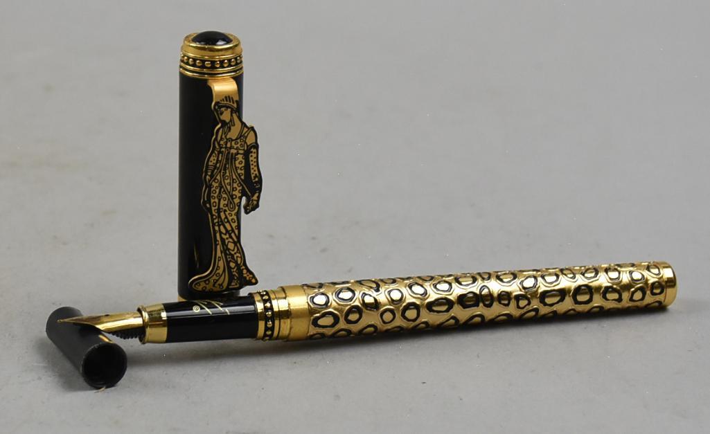 Franklin Mint House of Erte Fountain Pen: This great looking pen is a Franklin Mint Collector Pen for House of Erte with a facsimile of Erte's signature. Body of pen is a leopard pattern with an Art Deco Erte woman on the cap. TFM is on the n
