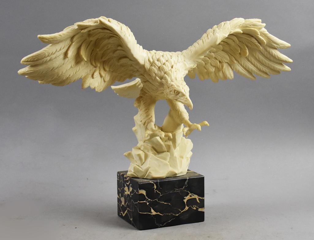 After Amilcare Santini Bald Eagle in Flight Sculpture: This is a wonderful bald eagle in flight and appearing to be about to land. Originally created by Amilcare Santini (1910-1975), this bird sculpture is marked on the lower part of the bird on the back,