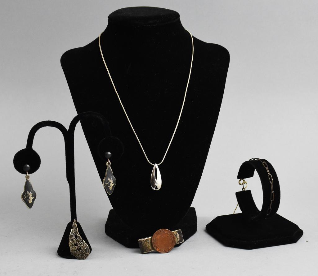 Vintage Sterling Jewelry Lot, Necklace, Earrings & More: Nice vintage jewelry lot includes a necklace with sterling and CZ pendant, Siam earrings, bracelet and a money clip with 1870 copper coin.