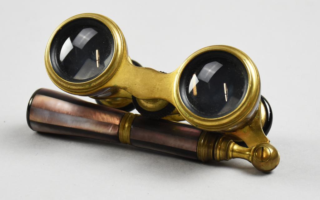 Antique French Brass & Mother of Pearl Opera Glasses: These gorgeous opera glasses with handle are believed to be of French origin. Appear brass with black viewer and purple tinted mother of pearl. No visible marks.