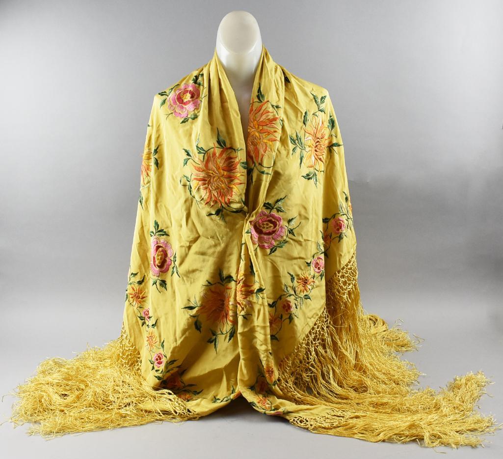 Antique Silk & Embroidered Piano Shawl: Stunning piano shawl is antique. Bright yellow silk with gold and pink embroidered Asian inspired flowers and long dramatic fringe, all in silk thread.