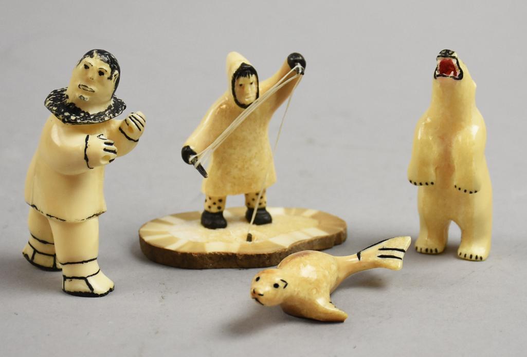 Vintage Inuit Carved Miniature Figurines: Very cute lot of vintage Inuit carved figurines. Lot is a polar bear, walrus, ice fisherman and an Eskimo. The tallest is approx 3" tall