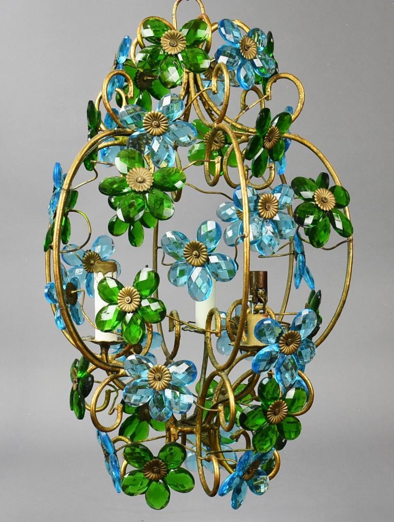 c1960 Cut Crystal Daisy Chandelier: This beautiful and unique chandelier is c1960. Stunning hanging light fixture with blue and green cut crystals and attached in the form of daisies. Each arm has a candle socket covers, C scroll frame