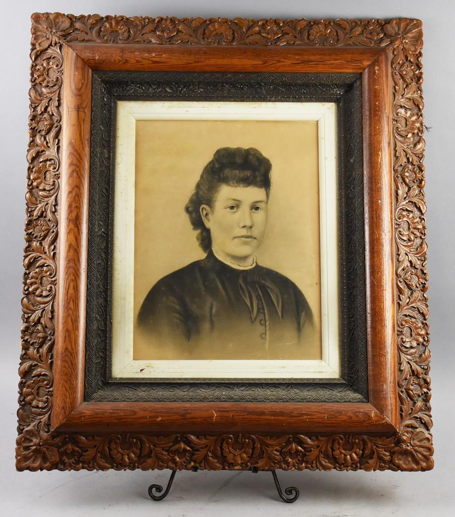 Victorian Era Charcoal Lady Portrait, Framed: This wonderful Victorian era portrait of a lady is done in charcoal. There is an illegible mark under the matte that is possibly the artist signature that has smeared. She is framed in a beautiful oak