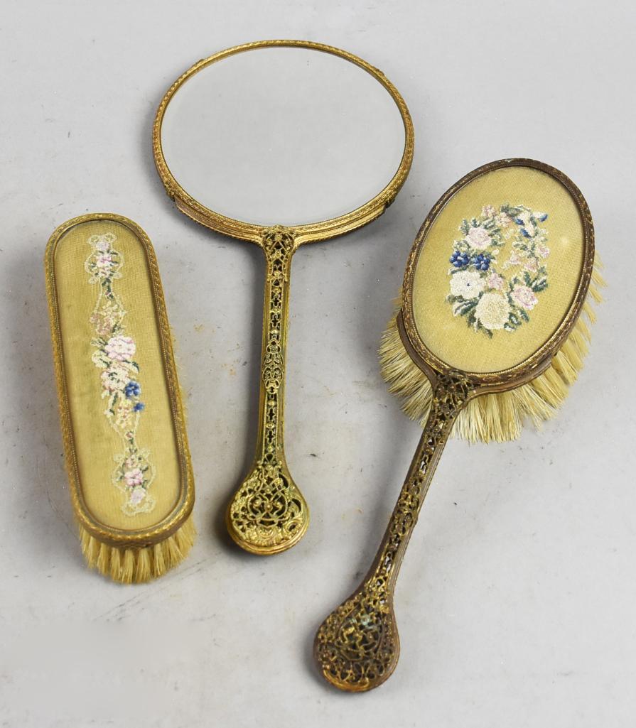 Vintage Petit Point, Filigree Handle Dresser Set: This wonderful set includes two brushes and hand mirror. Each is petit point silk embroidered and two with brass filigree handles. No visible markings, appears to be English made.