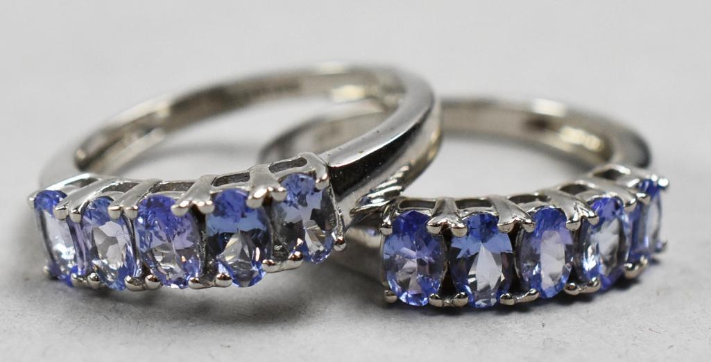 Pair Sterling Tanzanite Stone Rings w/ GLA Appraisals: Pair Silver Tanzanite Stone Rings w/ GLA Appraisals. Metal is platinum over 925. Sebastian stamped inside band. BOTH are oval cut Tanzanite gemstone rings, both are size 7, both set in platinum/sterli