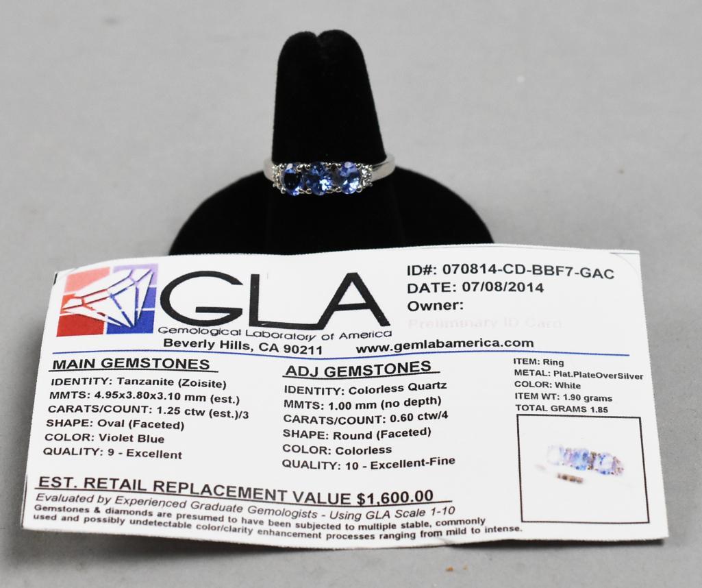 Sterling Tanzanite/Quartz Ring w/ GLA Appraisal: Sterling Tanzanite/Quartz Ring w/ GLA Appraisal. 1.85 overall grams. Ring size = 7