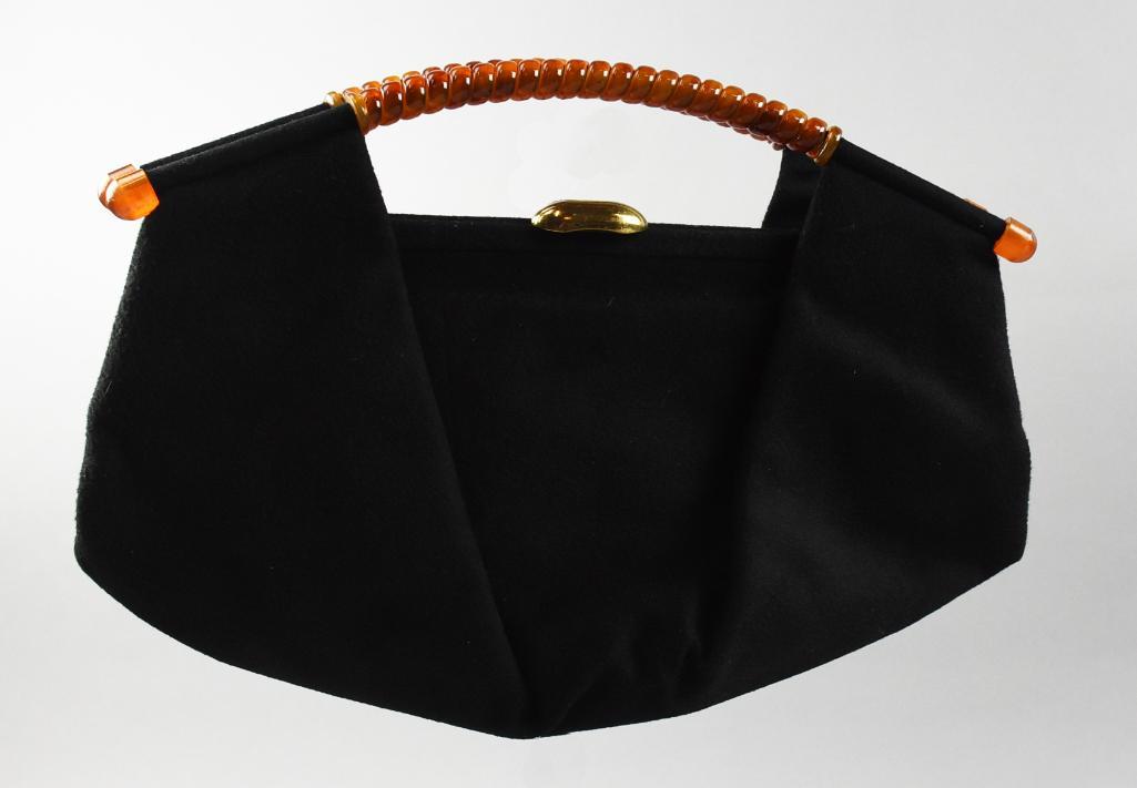 c1950 Bobbie Jerome Evening Bag, Lucite Handle MCM: Darling purse from designer Bobbie Jerome. Soft sided purse that is possibly wool with a tortoise lucite handle and flip locking clasp.