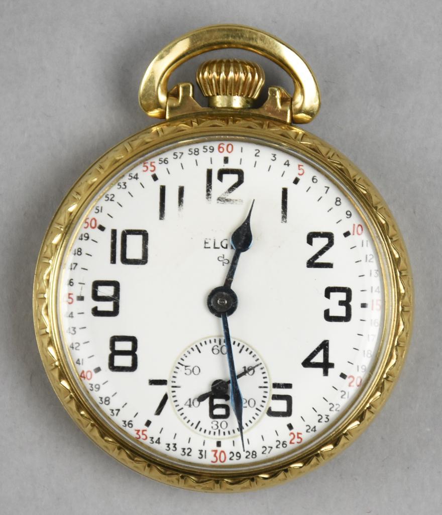 c1950 Elgin 575 Pocket Watch, 10K Gold Filled Case: Beautiful Elgin pocket watch, model 575, with a production date of c1950. It is a 15 jewel with 4 adjustment movement with serial number S 497327. 10k yellow gold filled case from Star Case Compan