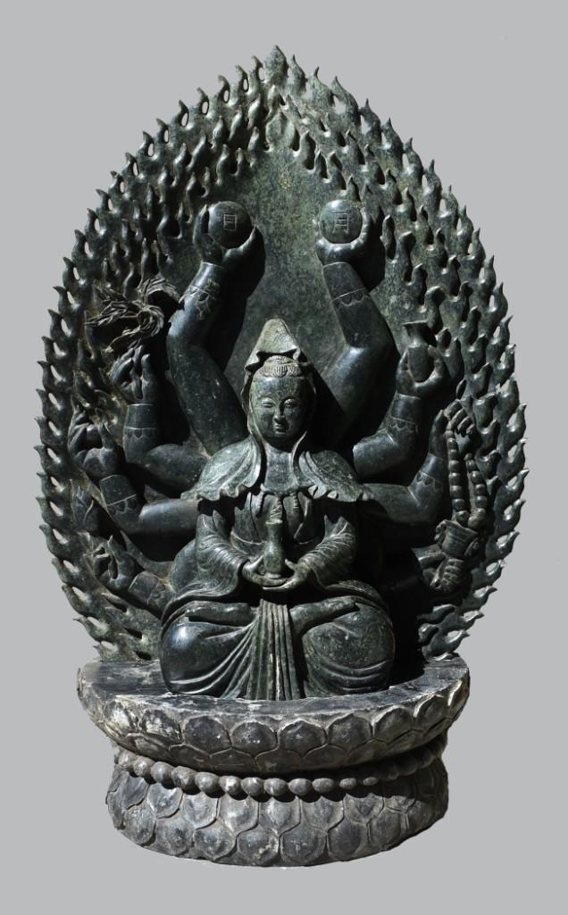 Vintage Tall Carved Nepherite Multi-Arm Guan Yin Buddha Statue: Lovely carved Nepherite Jade Guan Yin with multi-arms and holding a vase. She is seated on a lotus flower that is a carved out separate base. Excellent detail and measures approx 41" H x 27" W x 1