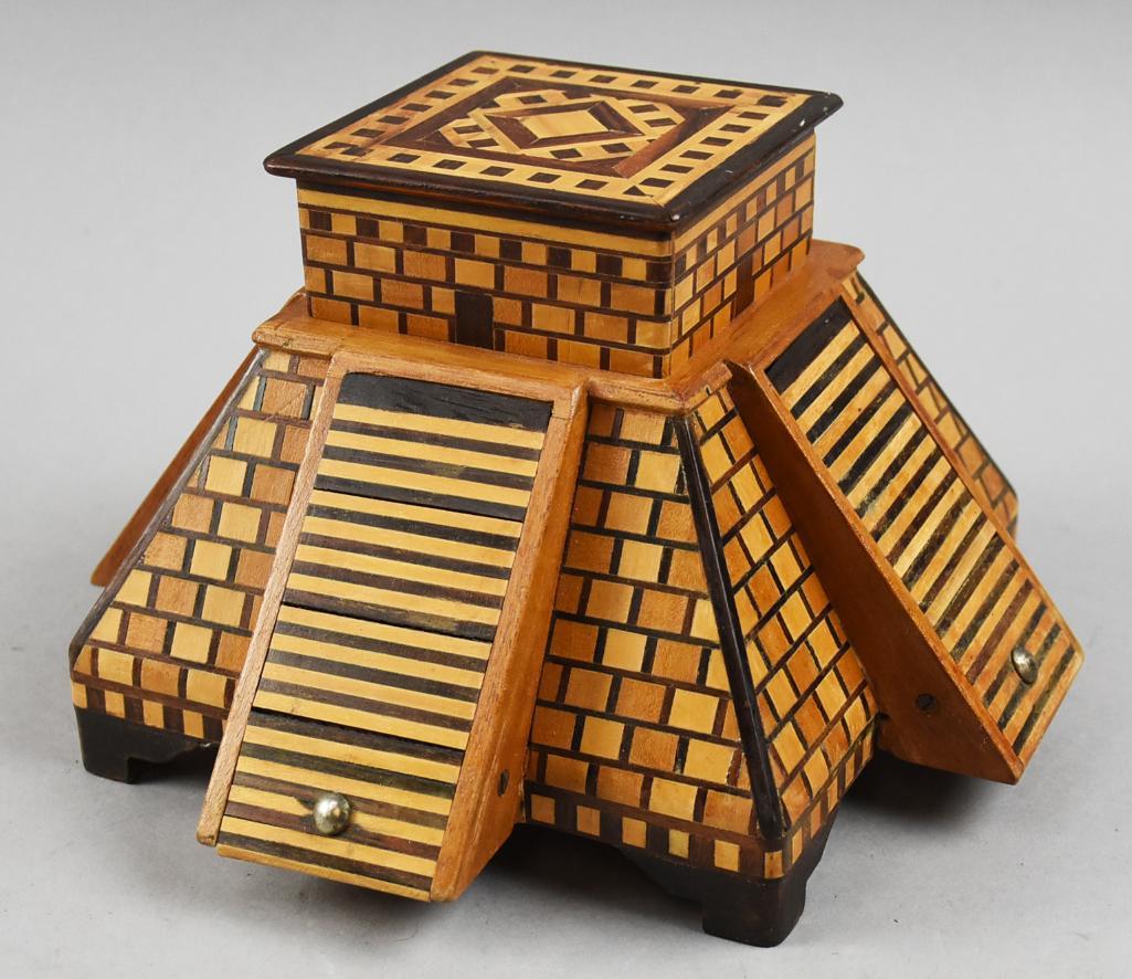 Vintage Folk Art Parquetry Cigarette Dispenser: Wonderful vintage folk art in a cigarette dispenser and match holder. Parquetry in multiple different wood colors in the form of a pyramid. Measures approx 5.5" tall x 9.5" x 9.5"