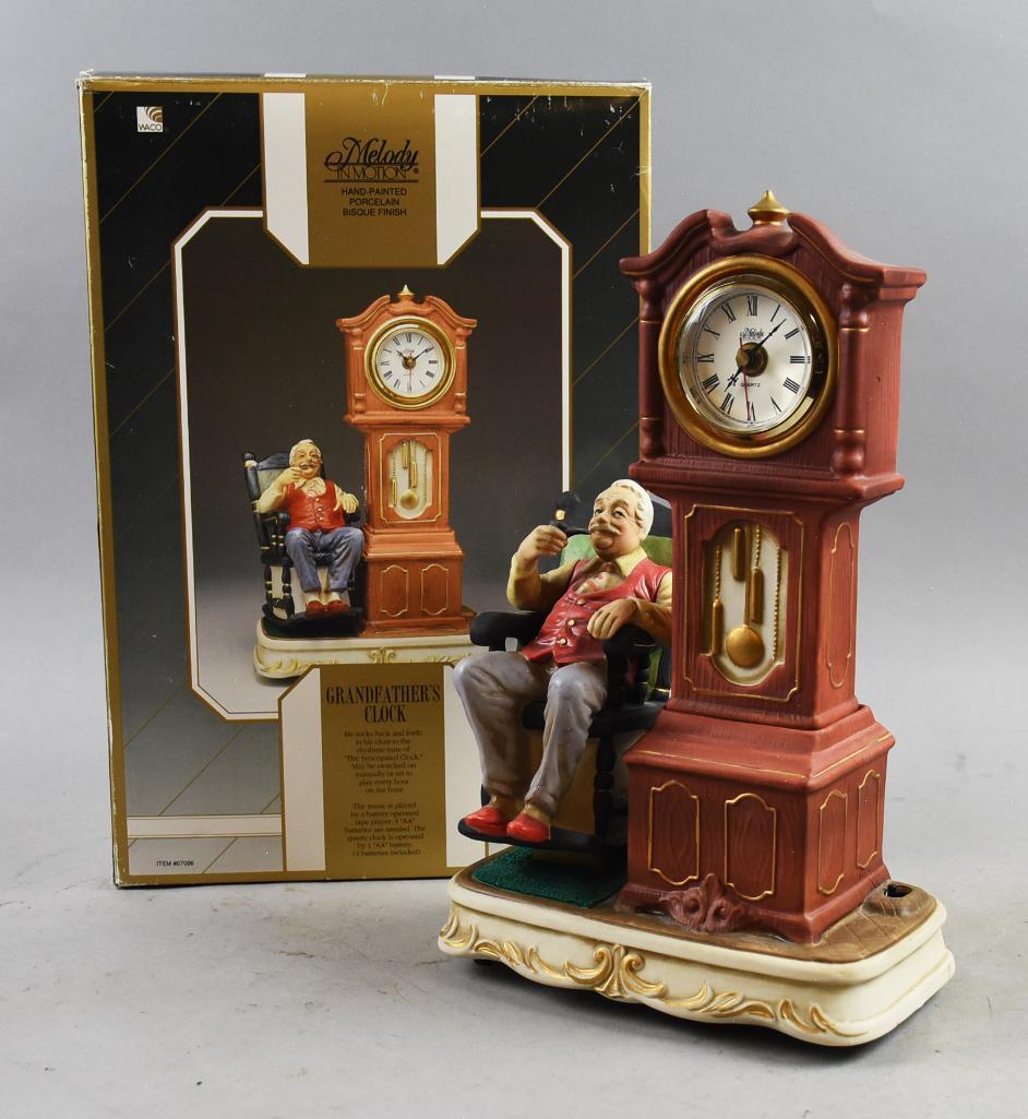Vintage Melody in Motion - Grandfather Clock: Cute Waco Melody in Motion musical Grandfather Clock.? Real clock with grandpa in motion. Battery operated in good working order , figure is approx. 14" tall.