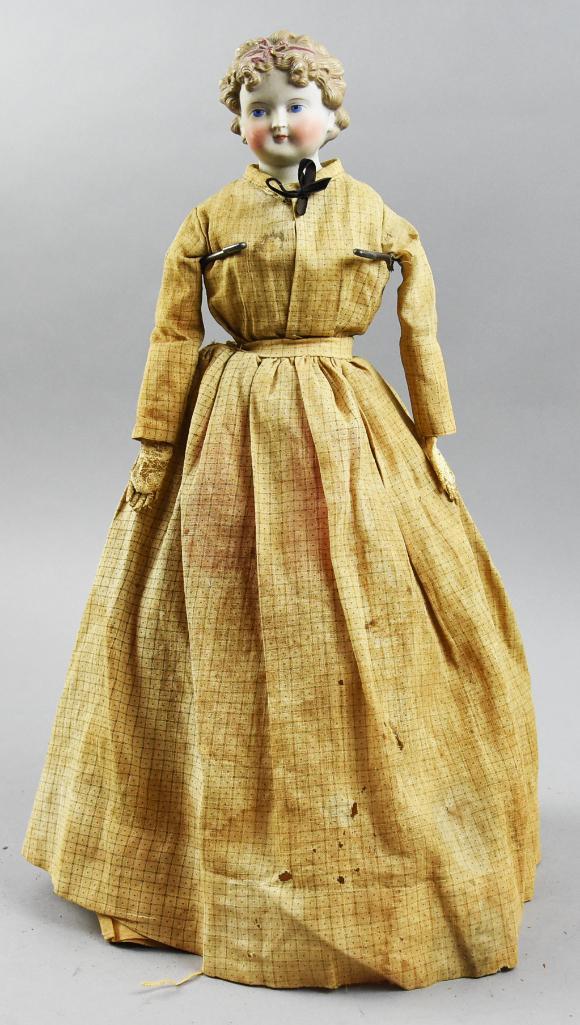 c1870 Dolly Madison Hair, Parian Head Doll, 17" Tall: Wonderful c1870 Dolly Madison style hair bisque head doll. Molded blond hair with molded bow, hand painted features. Kid leather arms with cloth body and feels like sawdust stuffing. Dress is possibly