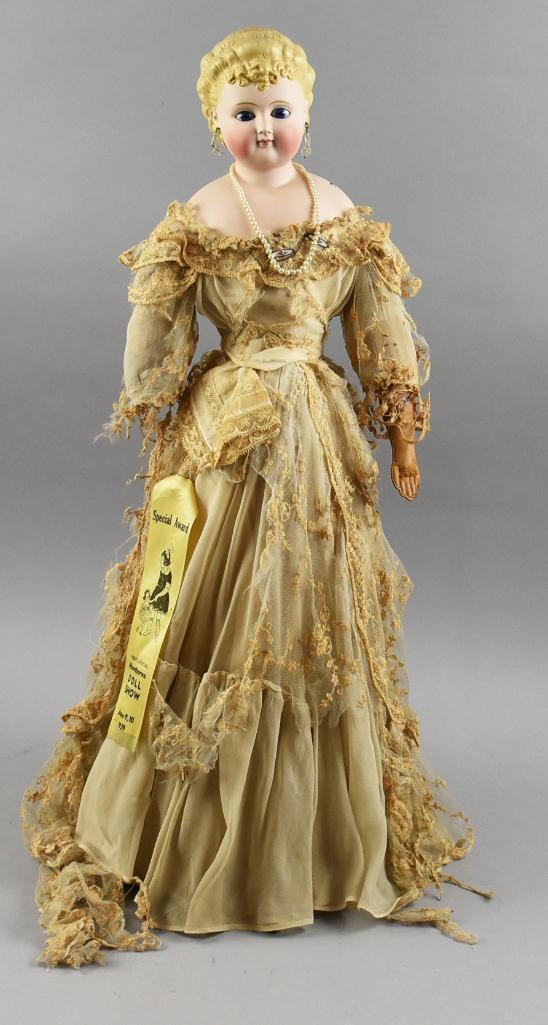c1860 Countess Dagmar Glass Eye Parian Doll, Award Winner: Wonderful c1860 Victorian parian doll won a Special Award at the First Annual Hawthorne Doll Show in California, 1939. She is unmarked with Countess Dagmar hair, glass paperweight eyes and pierced ear