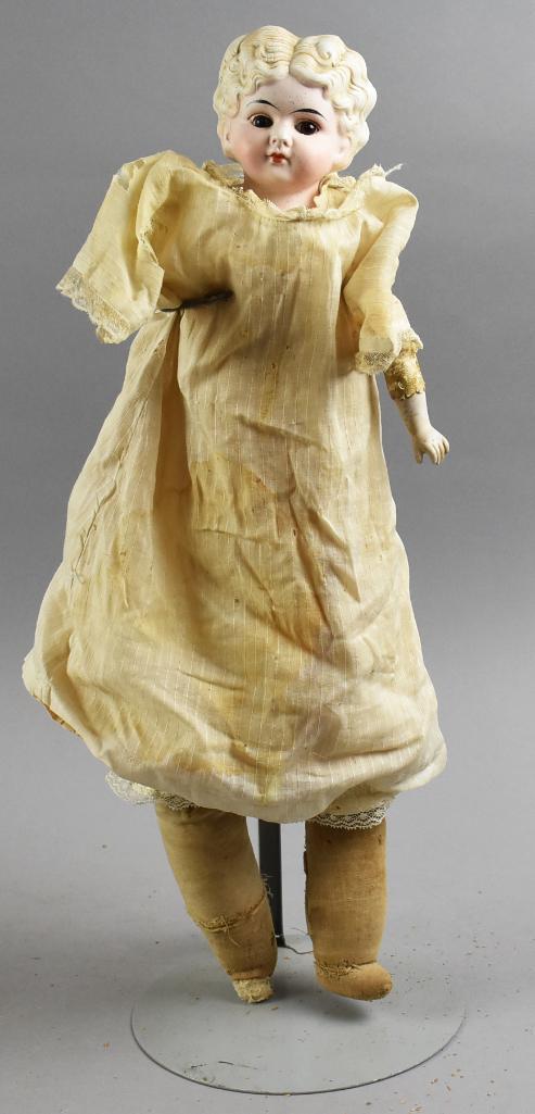 Unusual Antique Parian Bisque Head Doll, Glass Eyes: This little victorian lady is unusual in that she's got strange pitting that I've never seen before in her bisque head. She has blond low brow hair with glass eyes and hand painted features. Marked on