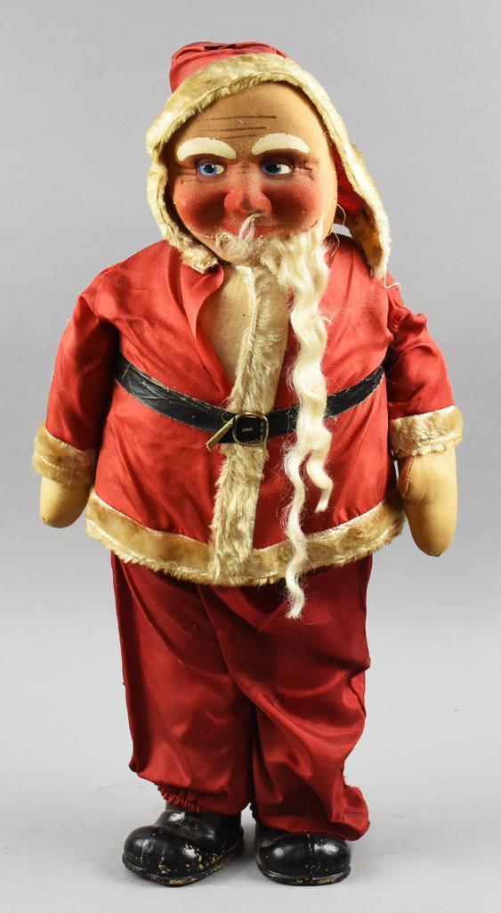 Vintage Molded Cloth Santa Claus Doll, 25" T: This fun Santa Claus is vintage with molded or pressed face with painted features and stuffed with sawdust. He is wearing is original suit, appears silk and painted boots. Stands approx 25" tall