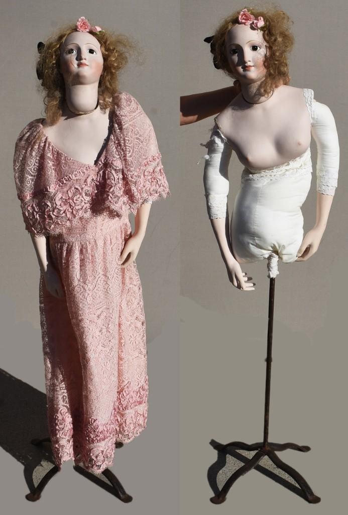 Extra Large Bisque Head Doll or Mannequin: This interesting lady life size doll mannequin has bisque head with bisque chest and arms and cloth torso. She has what appears to be real hair wig, glass paperweight eyes and hand painted features. S