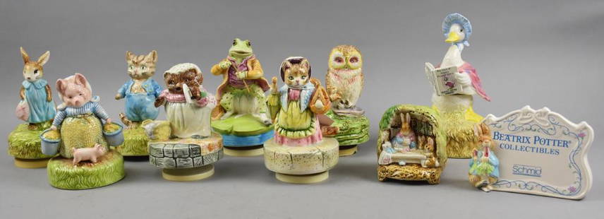 (10) Vintage Schmid Beatrix Potter Porcelain Music Boxes: Sweet lot of vintage Schmid Beatrix Potter themed music boxes and one Schmid ceramic store sign. Characters include Mrs. Flopsy Bunny, Mr. Jeremy Fisher, Mrs. Ribby and more. All measure from 4" to