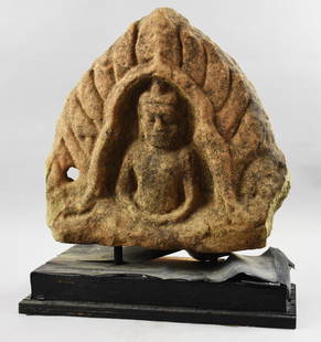 Antique Sandstone Buddha, Seated Lotus Position: This seated Buddha appears to be sandstone and possibly dating from the 11th-13th century and possibly Cambodian. It is mounted to a wooden base, appearing to be made custom to fit this piece. Measure