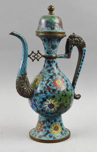 Ming Dynasty Maek CloisonnÃ©  Dragon Handle Teapot, Marked: This spectacular teapot is marked with the Great Ming mark and believed to be the Yongle reign. Cloisonne over what appears to be bronze in an ornate floral design with figural dragon handle and spout