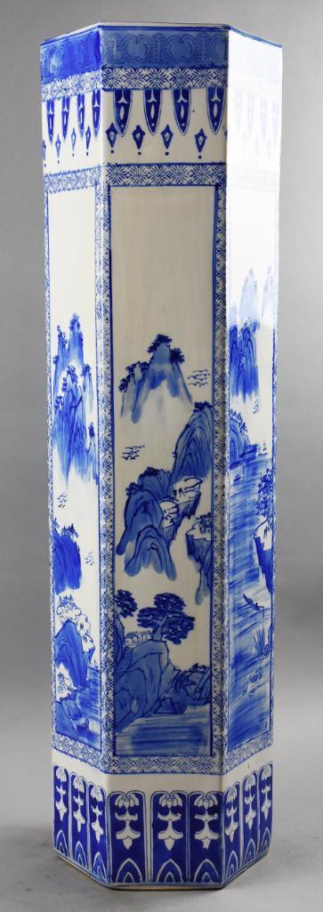 Antique Chinese Porcelain Blue & White Umbrella Stand: This wonderful umbrella stand appears to be of Chinese origin. Hexagon paneled porcelain with a hand painted landscape all around. No visible markings and measures 33" tall x 9.5" across