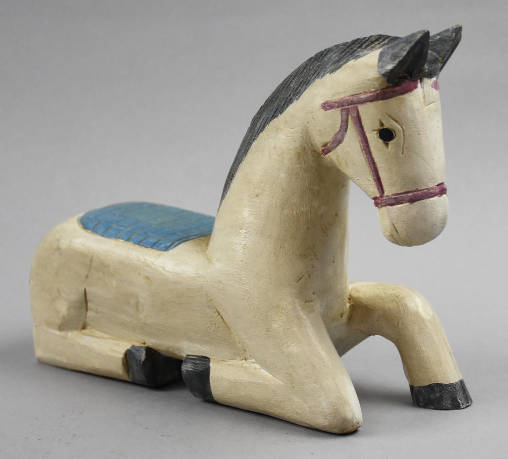 Vintage Hand Carved Thailand Reclining Horse: This pretty horse is from Thailand. It has been hand carved and hand painted. Retains original label and measures 6.5" tall x 3" x 9"