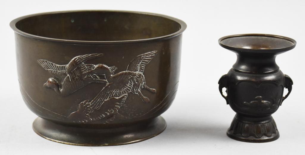 Vintage Japanese Bronze Vases, One Marked: These pretty vases are believed to be of Japanese origin. Both appear bronze with low relief. The basin is flying cranes with no visible markings. The small urn style are small birds and some foliage.