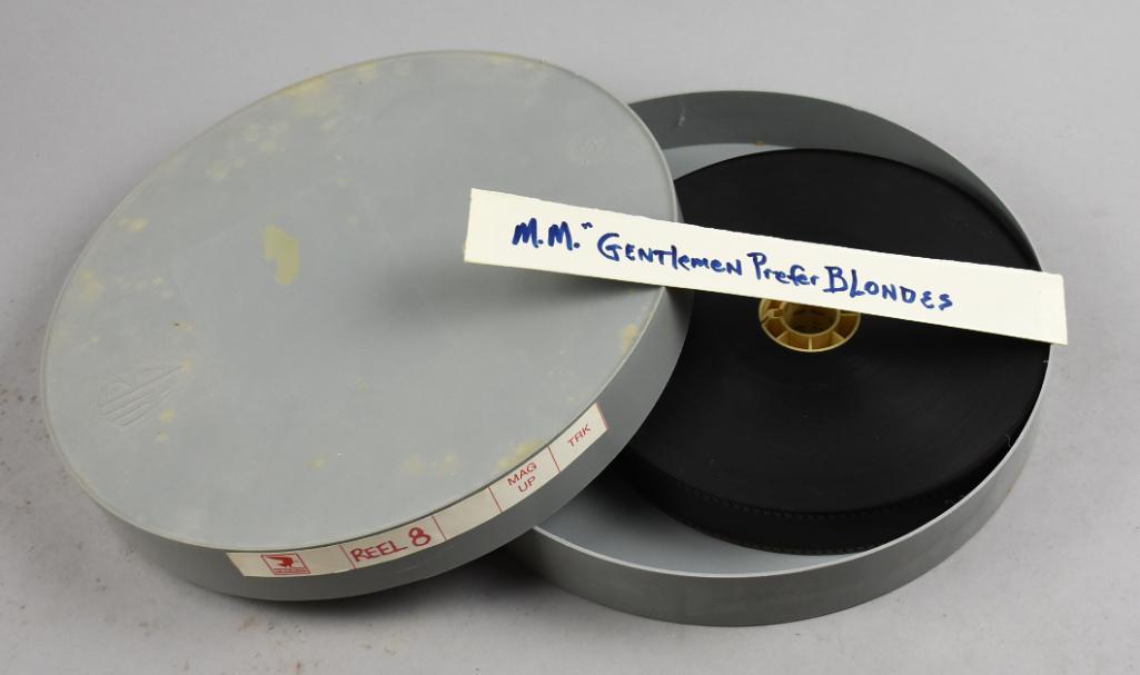 1958 Gentlemen Prefer Blondes Film Reel, Monroe & Russell: This is a film reel from the 1958 movie Gentlemen Prefer Blondes starring Marilyn Monroe and Jane Russell. This is most likely not the movie in it's entirety. It comes in a contemporary Warner Brother
